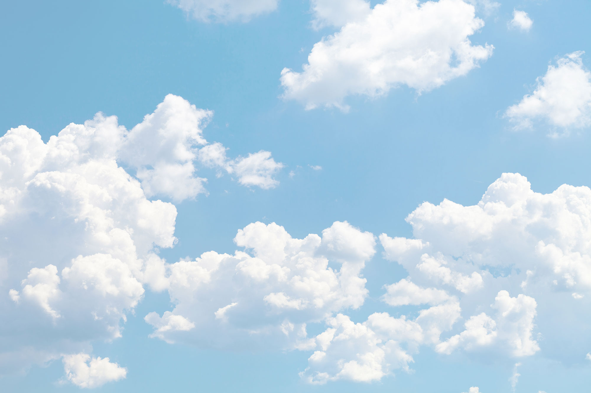 Bright blue sky with clouds